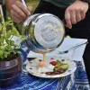 Chilienne en bois et cuisine extérieure : l’alliance élégante du confort et du paysage