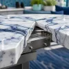 Élégance d’une table en marbre extensible pour sublimer la cuisine extérieure